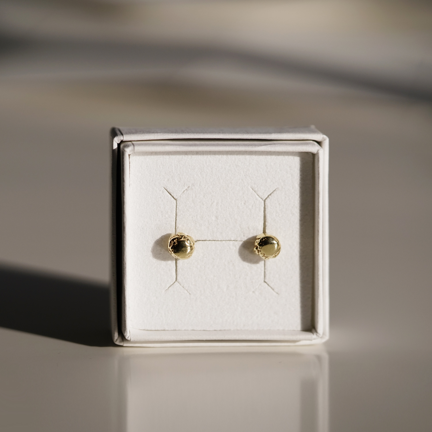 Artefact gold plated ball earrings - NURA.design